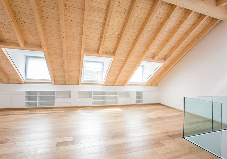 Travi a vista e finiture estetiche in legno