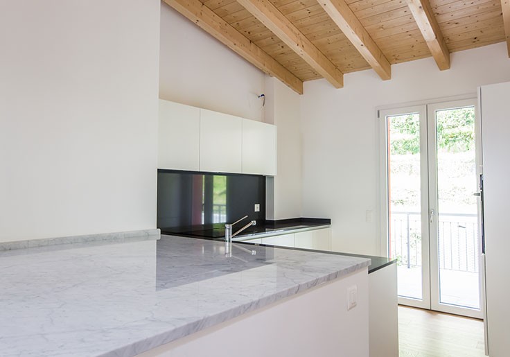 Travi a vista e finiture estetiche in legno